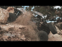 Load and play video in Gallery viewer, The Axial RR10 Bomber 1/10th Scale Electric 4WD