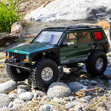 Load image into Gallery viewer, 1/10 SCX10 III Jeep Cherokee XJ 4X4 RTR Brushed Rock Crawler, Green by Axial
