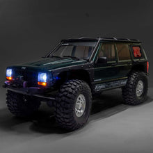 Load image into Gallery viewer, 1/10 SCX10 III Jeep Cherokee XJ 4X4 RTR Brushed Rock Crawler, Green by Axial
