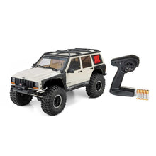 Load image into Gallery viewer, 1/10 SCX10 III Jeep Cherokee XJ 4X4 RTR Brushed Rock Crawler, Green by Axial
