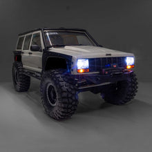 Load image into Gallery viewer, 1/10 SCX10 III Jeep Cherokee XJ 4X4 RTR Brushed Rock Crawler, Green by Axial
