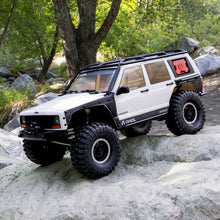 Load image into Gallery viewer, 1/10 SCX10 III Jeep Cherokee XJ 4X4 RTR Brushed Rock Crawler, Green by Axial
