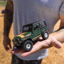 Load image into Gallery viewer, 1/30 SCX30 Jeep CJ-7 Renegade 4X4 RTR Brushed Rock Crawler (Battery &amp; Charger Included)

