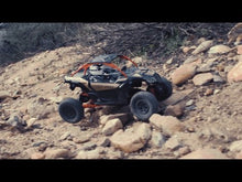 Load and play video in Gallery viewer, The Axial Yeti Jr.™ Can-Am® Maverick 1/18th Scale Electric 4WD
